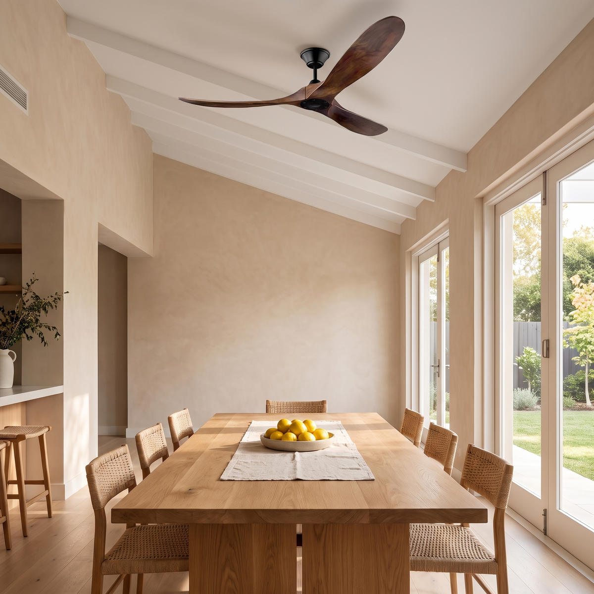 Karri ceiling fan installed above a dining table on a raked ceiling