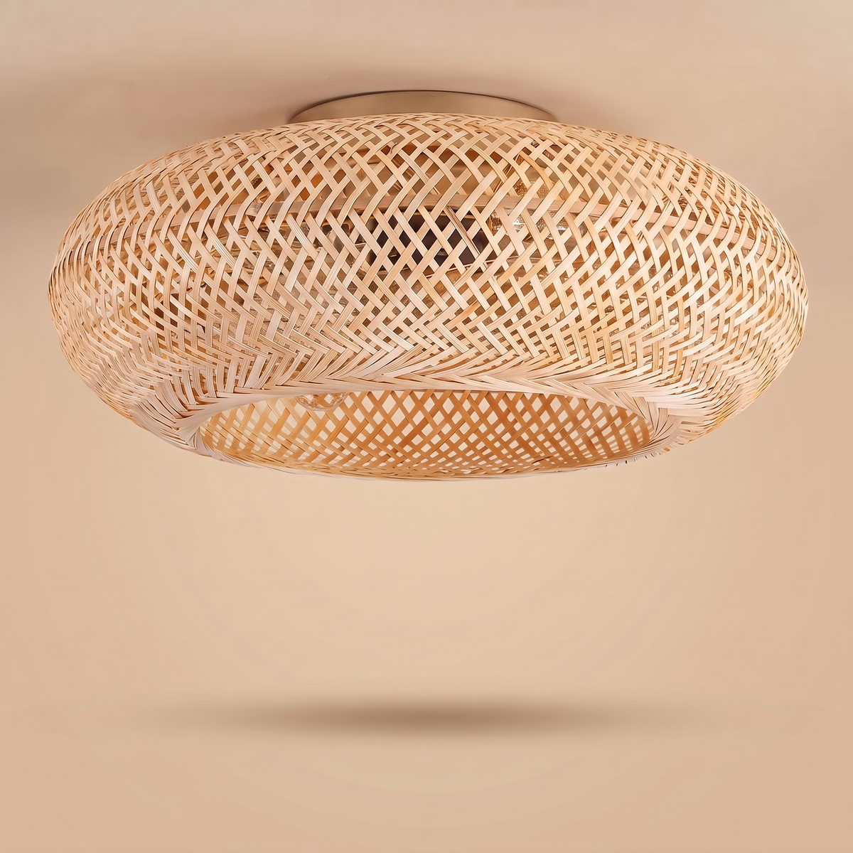 Noosa hand-woven bamboo ceiling fan, low round shape, studio product shot