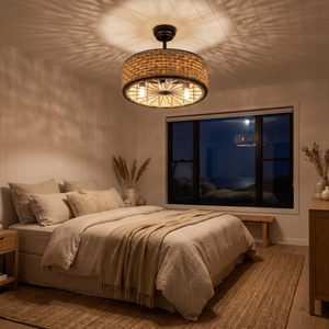 Cove rattan cage ceiling fan lit in the evening